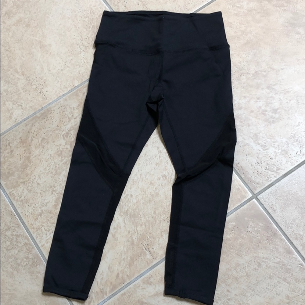 Black Capri leggings with mesh detail